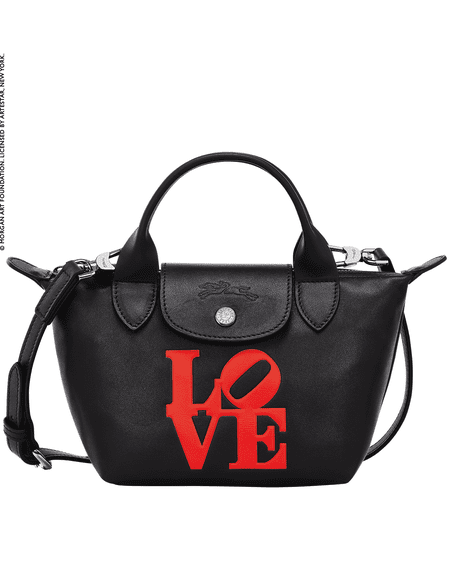Bolsa Longchamp preta com letras